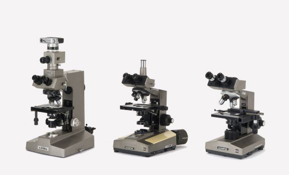Upright microscope series (left to right) launched in the 1970s, the AH Series (1972), the BH Series (1974), and the CH Series (1976)